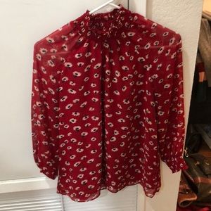 Red floral blouse